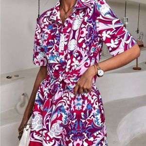 Multi colored short set with button up blouse.